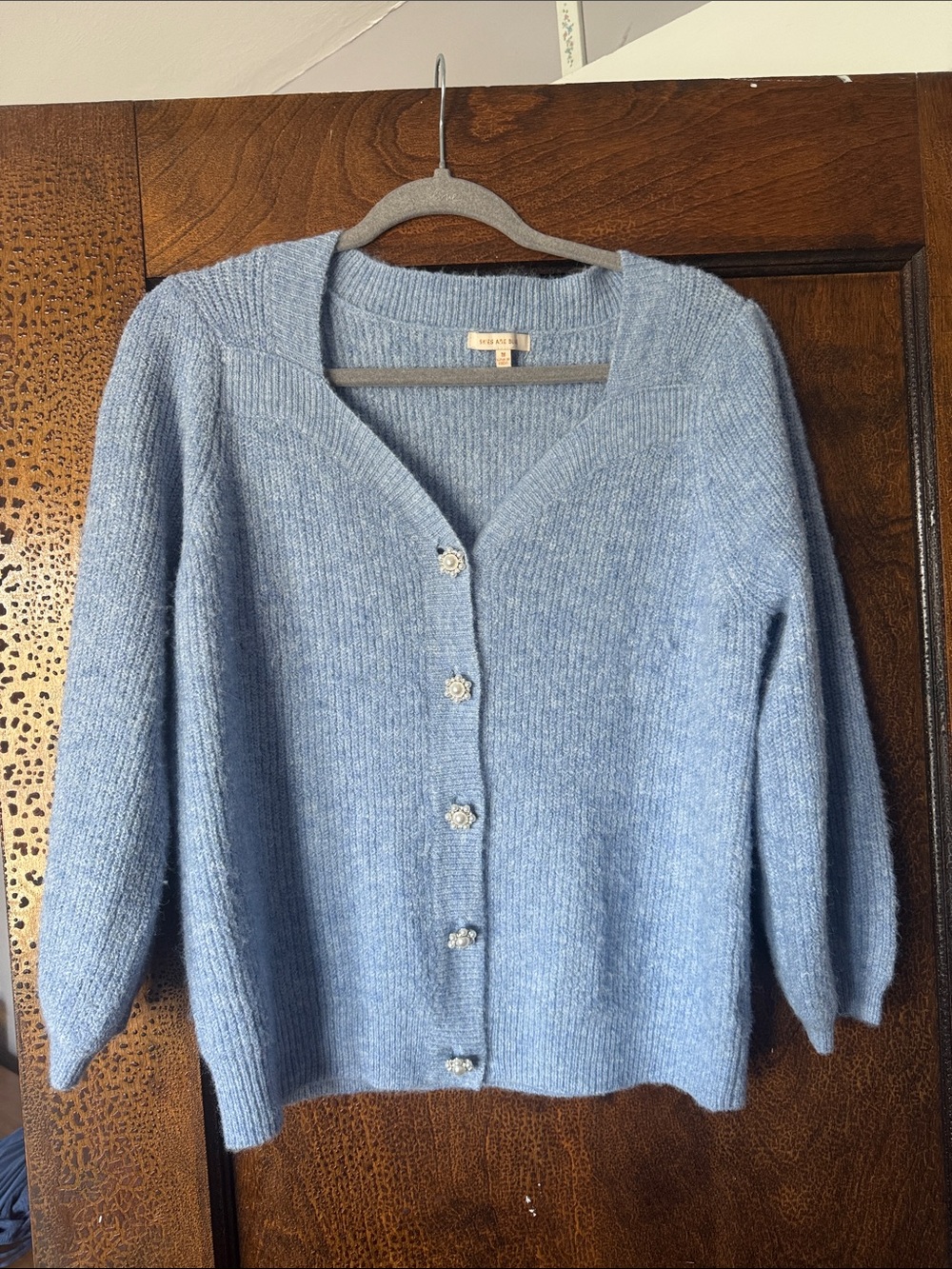 Skies are Blue Women's Light Blue V-Neck Button Cardigan Sweater. Pearl accents